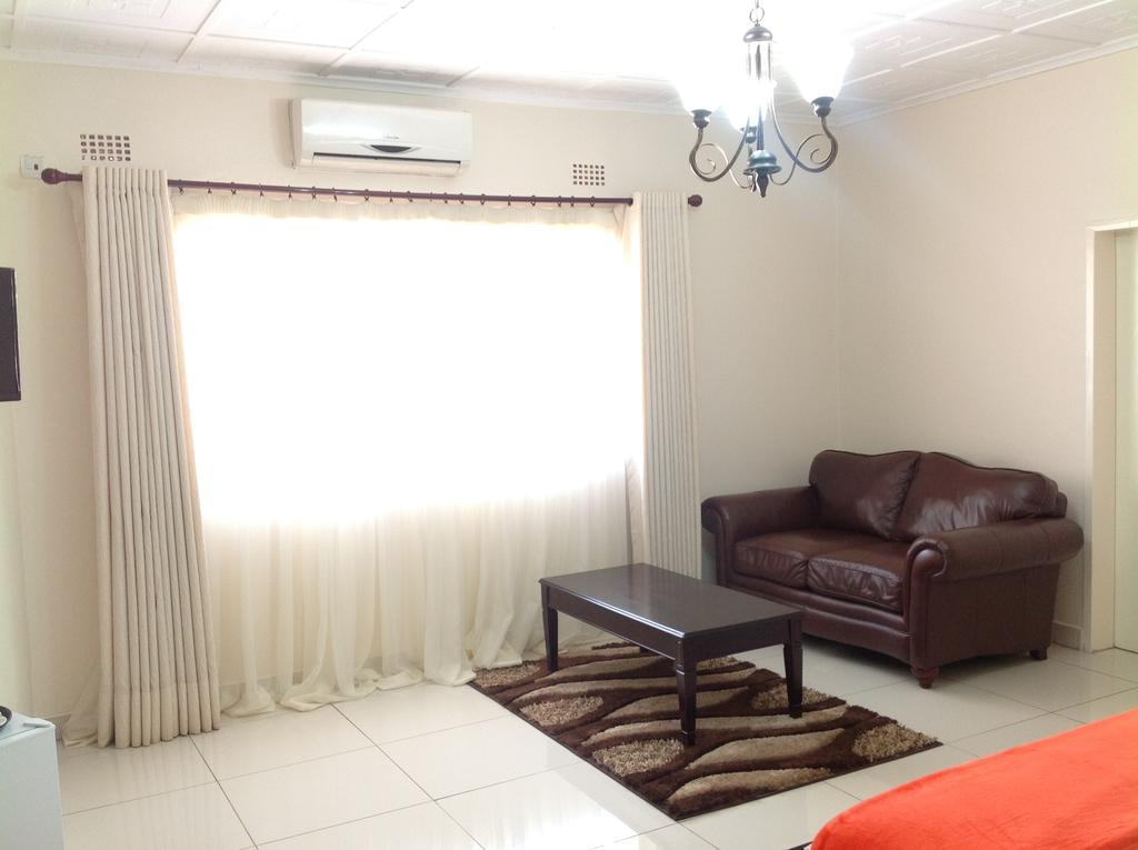 Cypress Executive Lodge Livingstone Quarto foto